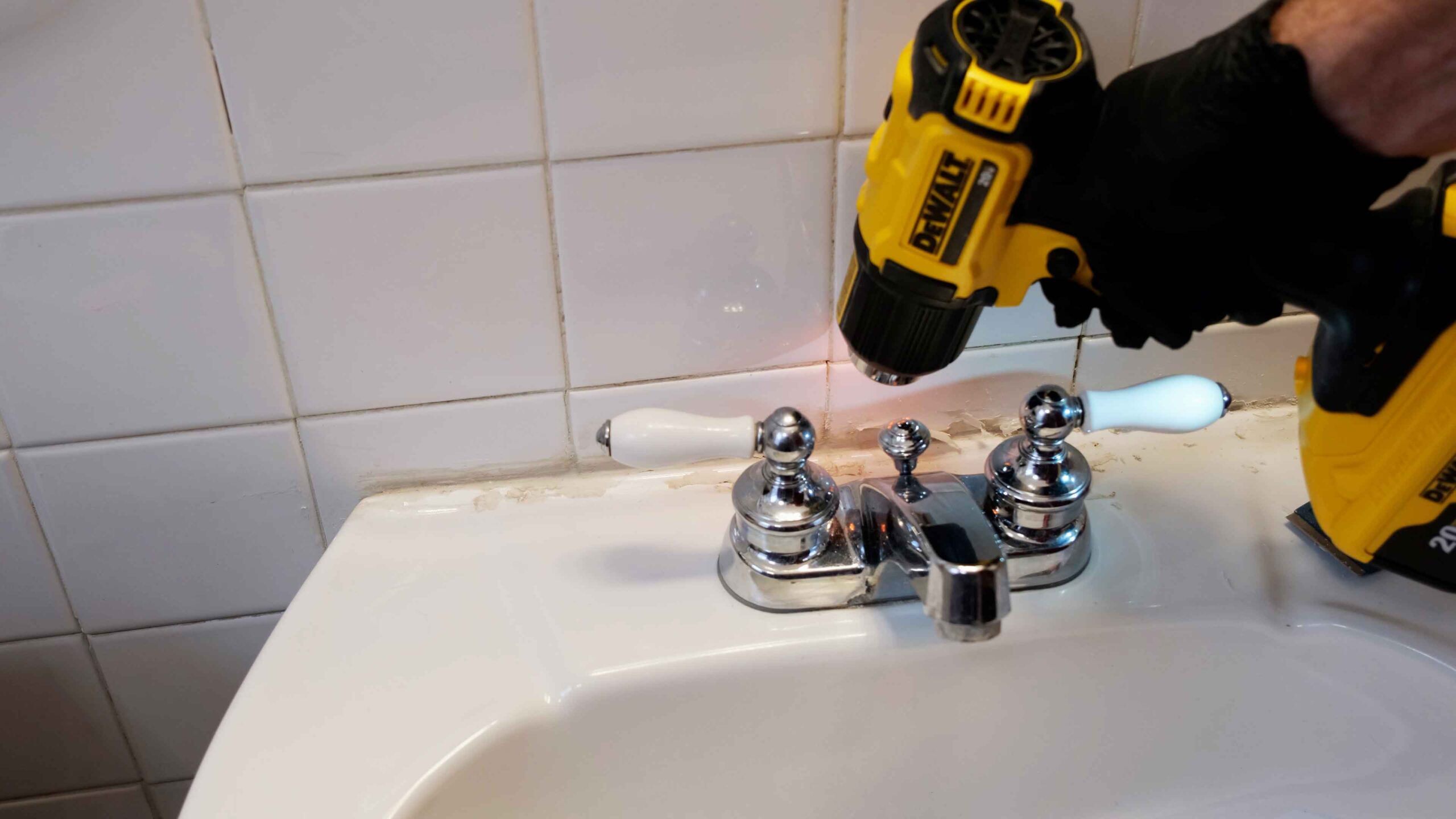 Remove caulk from deals sink